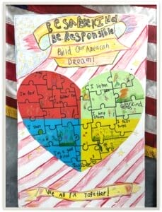 Division 1 Law Day 2026 Winning Poster. A heart made from puzzle pieces with the American flag as a background.