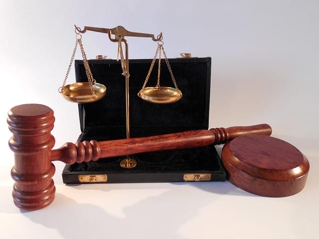 A gavel and a set of scales.