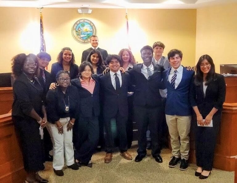 Photo of Key West High School and Coral Shores High School students -District 16 Mock Trial Competition with Judge Derek Lewis
